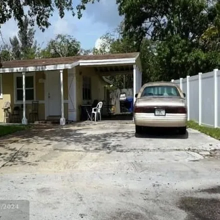 Buy this 4 bed house on 1899 Northwest 15th Court in Middle River Vista, Fort Lauderdale