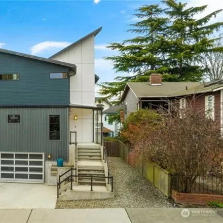 Buy this 4 bed house on 1322 42nd Avenue Southwest in Seattle, WA 98116