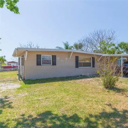 Buy this 2 bed house on 13277 Neptune Drive in Hudson, FL 34667