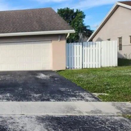 Image 1 - 8621 Northwest 52nd Court, Lauderhill, FL 33351, USA - House for rent