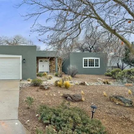 Buy this 4 bed house on 6058 Mesquite Drive Northeast in Albuquerque, NM 87109
