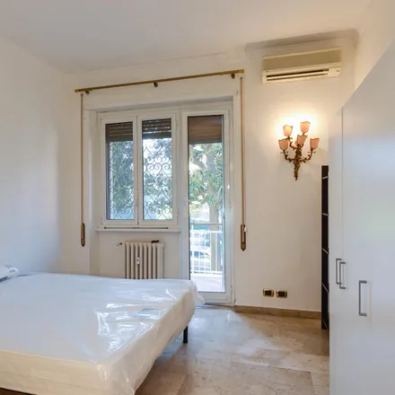 Rent this 6 bed room on Via Dodecaneso 9 in 00144 Rome RM, Italy