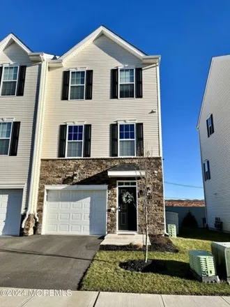 Buy this 3 bed townhouse on 242 Katie Lynn Court in Brick Township, NJ 08723