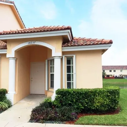 Rent this 2 bed townhouse on 14237 Southwest 121st Place in Miami-Dade County, FL 33186