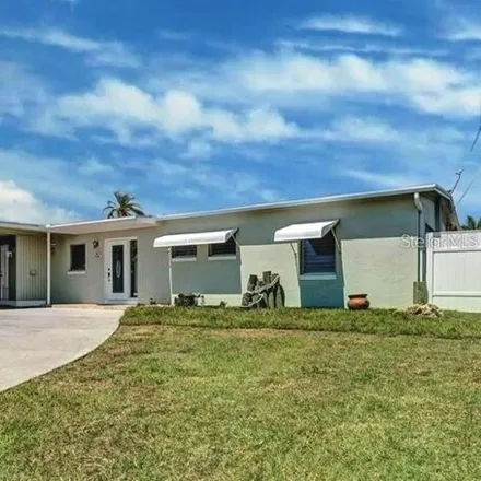Rent this 3 bed house on 21048 Edgewater Drive in Port Charlotte, FL 33952