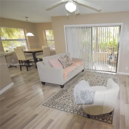 Rent this 1 bed condo on 9999 Summerbreeze Drive in Sunrise, FL 33322