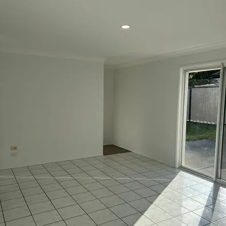 Rent this 3 bed apartment on Kingarry Circuit in Merrimac QLD 4226, Australia
