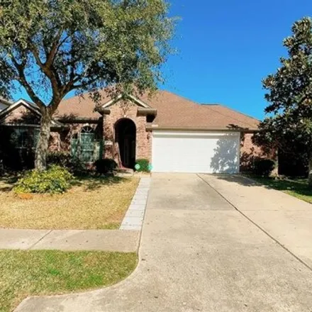 Rent this 4 bed house on 2936 Sandleigh Drive in Harris County, TX 77388