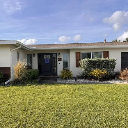 Buy this 3 bed house on 428 Penguin Drive in South Patrick Shores, Brevard County