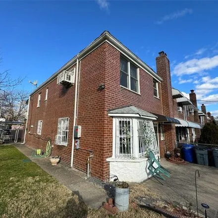 Buy this 5 bed house on 66-05 Garfield Avenue in New York, NY 11377