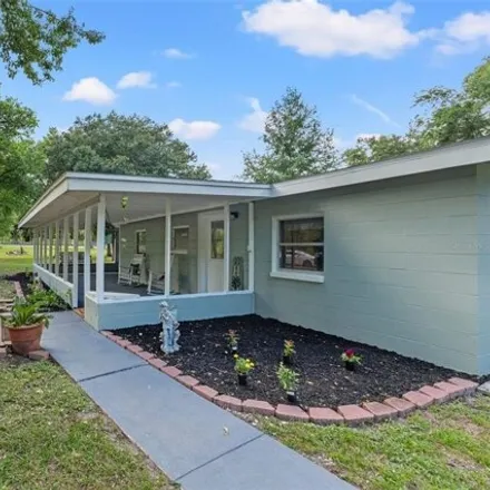 Buy this 4 bed house on 21351 Kenova Rd in Brooksville, Florida