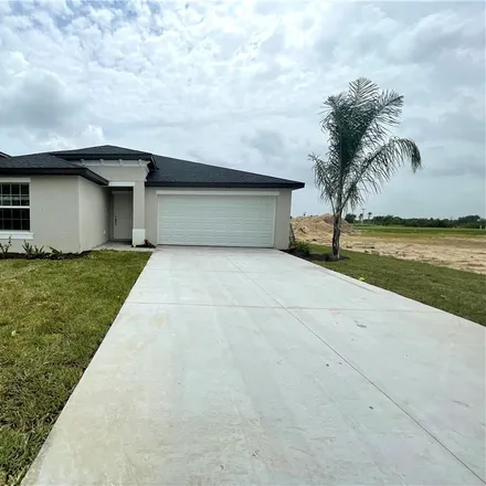 Rent this 4 bed house on 2999 Villa Avenue S in Lehigh Acres, FL 33976