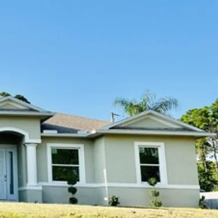 Rent this 4 bed house on 502 El Sito Avenue Southeast in Palm Bay, FL 32909