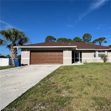 Rent this 3 bed house on 521 Calvin Avenue in Lehigh Acres, FL 33972