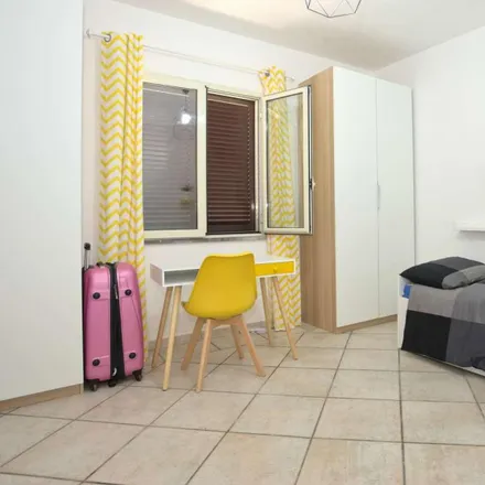 Rent this 7 bed room on Via Carlentini in 00132 Rome RM, Italy