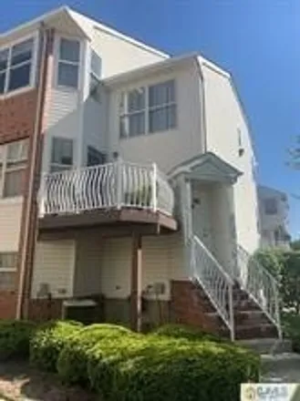 Rent this 4 bed house on 812 Harbortown Blvd Unit 812 in Perth Amboy, New Jersey