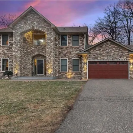 Buy this 4 bed house on 10496 Hidden Oaks Court North in Champlin, MN 55316