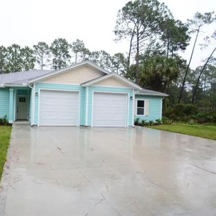 Rent this 3 bed house on 91 Lloyd Trail in Palm Coast, FL 32164