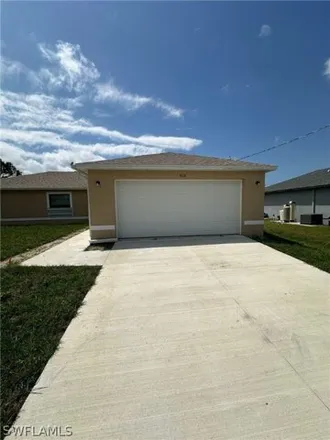 Rent this 3 bed house on 4186 Northeast 20th Place in Cape Coral, FL 33909