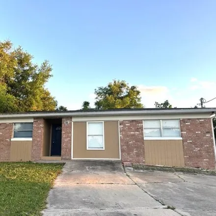 Rent this 3 bed house on 228 East Holly Drive in Orange City Hills, Volusia County