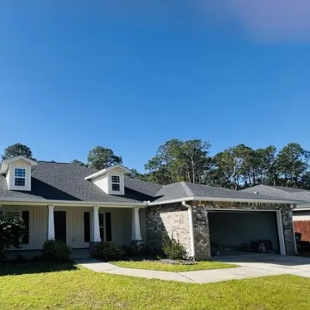 Buy this 4 bed house on 9119 Timber Lane in Navarre, FL 32566