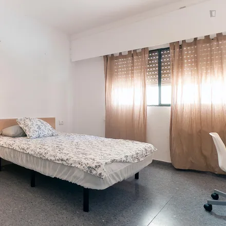 Rent this 4 bed room on Carrer del Batxiller in 27, 46010 Valencia