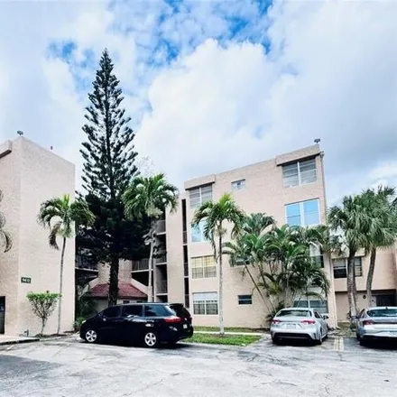 Buy this 2 bed condo on live oak place in 9431 Live Oak Place, Pine Island Ridge