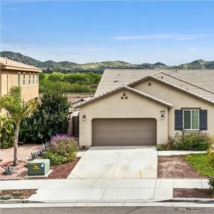 Rent this 4 bed house on 11959 Tributary Way in Jurupa Valley, CA 91752