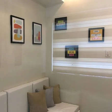 Rent this 1 bed condo on Senate of the Philippines in J. W. Diokno Boulevard, Zone 10