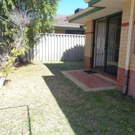 Rent this 3 bed apartment on Redbud Mews in Cooloongup WA 6169, Australia