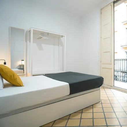 Rent this 3 bed room on Carrer Nou de la Rambla in 106, 08001 Barcelona