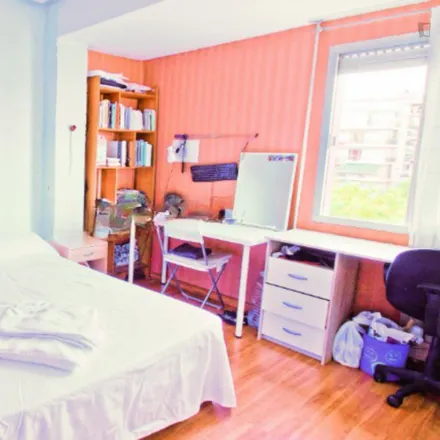 Rent this 3 bed room on Horno María in Carrer del Poeta Mas i Ros, 46021 Valencia