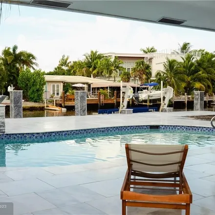 Rent this 4 bed house on 2116 Northeast 25th Street in Middle River Manor, Wilton Manors