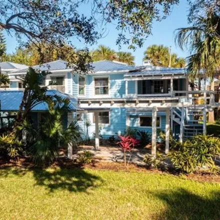 Buy this 5 bed house on 1603 North Indian River Road in New Smyrna Beach, FL 32169