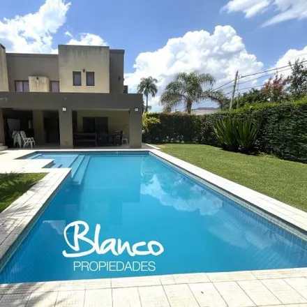 Rent this 4 bed house on unnamed road in La Lonja, Buenos Aires