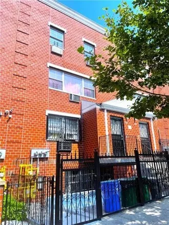 Buy this 8 bed house on 842 Bryant Avenue in New York, NY 10474