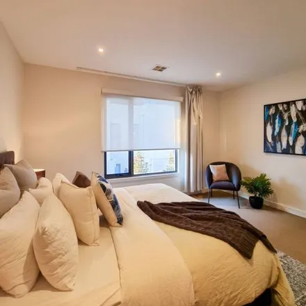 Rent this 3 bed townhouse on Yum Organic in Glen Huntly Road, Caulfield VIC 3162