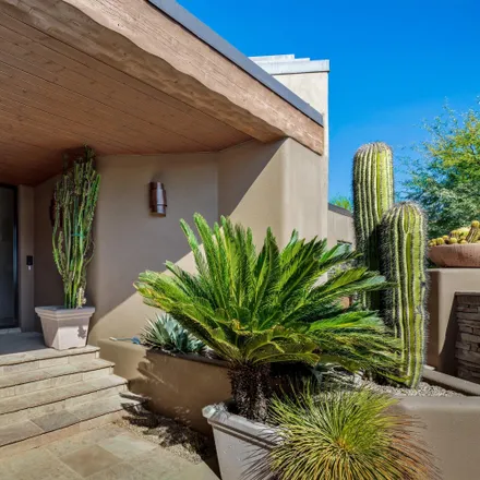 Rent this 4 bed house on Desert Mountain Geronimo Golf Course in 10550 East Desert Hills Drive, Scottsdale