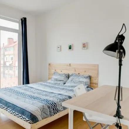 Rent this 6 bed room on Rua Morais Soares