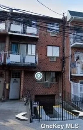 Buy this 7 bed townhouse on 58-15 Waldron Street in New York, NY 11368