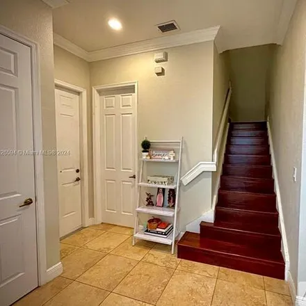 Image 2 - 6054 NW 116th Dr, Unit 6054 - Townhouse for rent