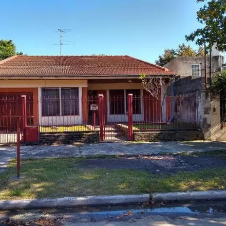 Buy this 3 bed house on Santiago Puccini 364 in Partido de Lomas de Zamora, B1828 HGV Lomas de Zamora
