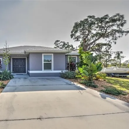 Buy this 4 bed house on 5717 Little House Lane in Lee County, FL 33922
