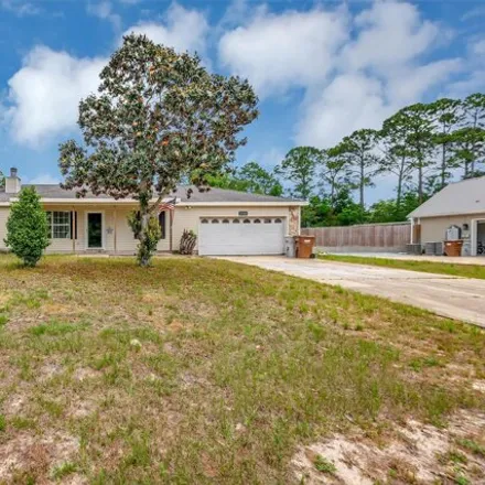 Buy this 3 bed house on 2088 Casa de Oro Street in Navarre, FL 32566
