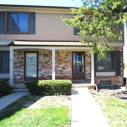 Rent this 2 bed townhouse on 17666 Kingsbrooke Circle in Clinton Township, MI 48038