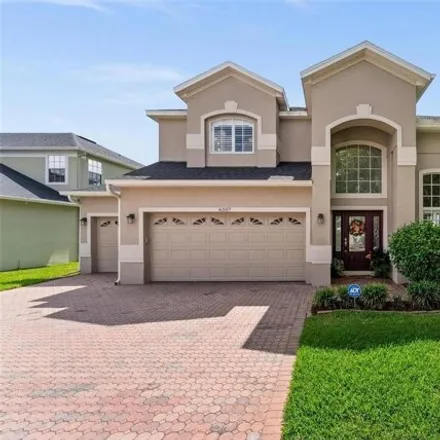 Buy this 5 bed house on 6497 Lake Pembroke Place in Orlando, FL 32829