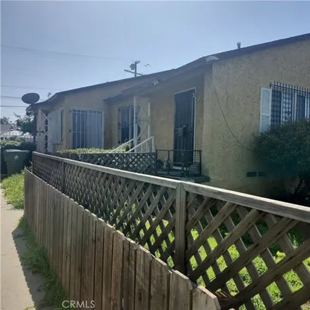 Buy this 4 bed house on 686 East 120th Street in Los Angeles, CA 90059