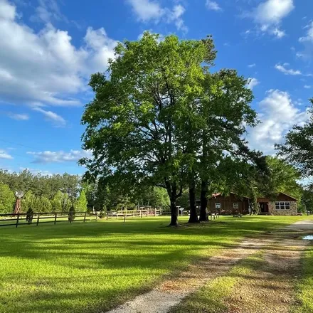 Buy this 4 bed house on 500 Wh Tullos Road in Trinity County, TX 75926