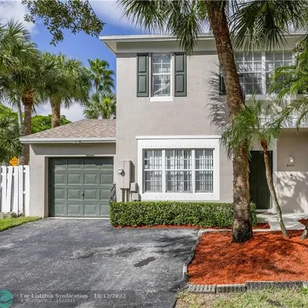 Buy this 3 bed townhouse on 6001 Black Plum Court in Tamarac, FL 33321