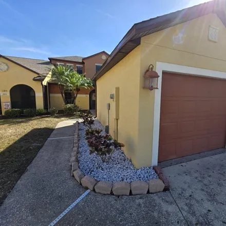 Rent this 3 bed house on 1200 Luminary Circle in Melbourne, FL 32901